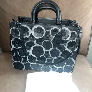 Coach Matte Black Tea Rose Rogue